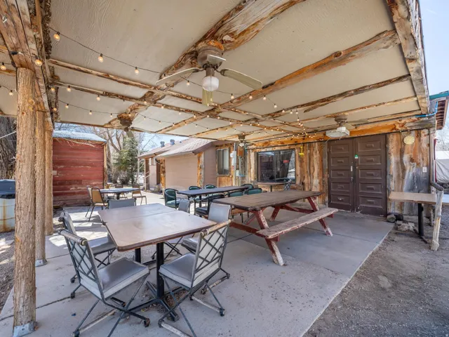 View of patio / terrace with outdoor dining space and a ceiling fan