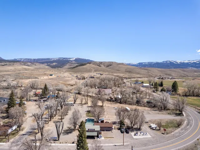 View of mountain backdrop featuring rural landscape