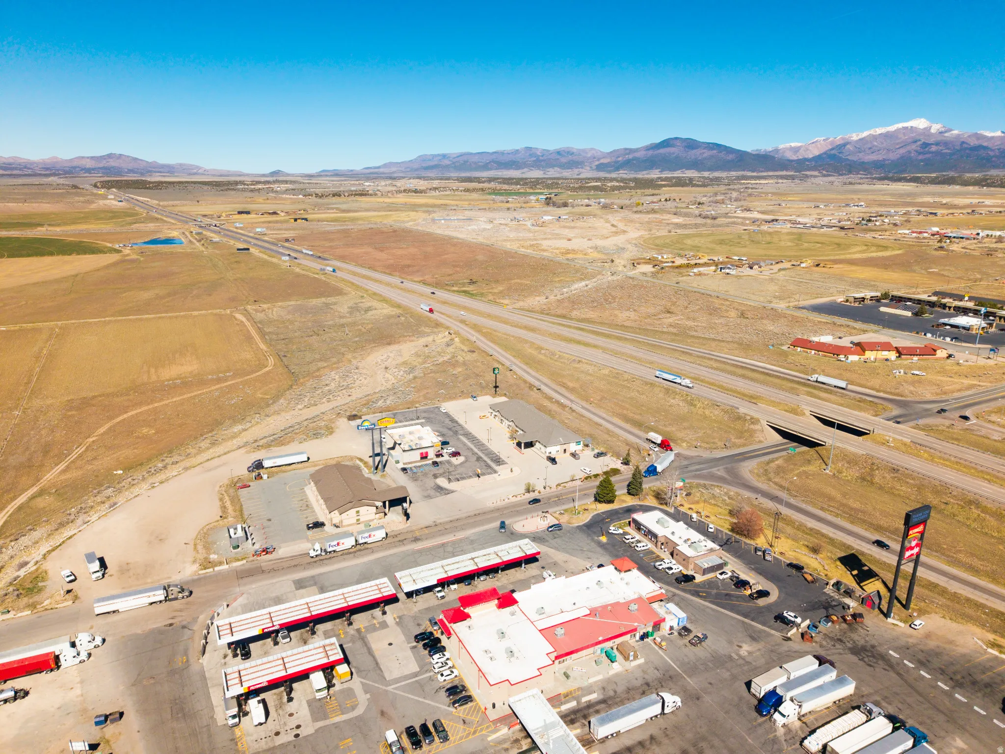 View of property location with a mountain backdrop and rural landscape