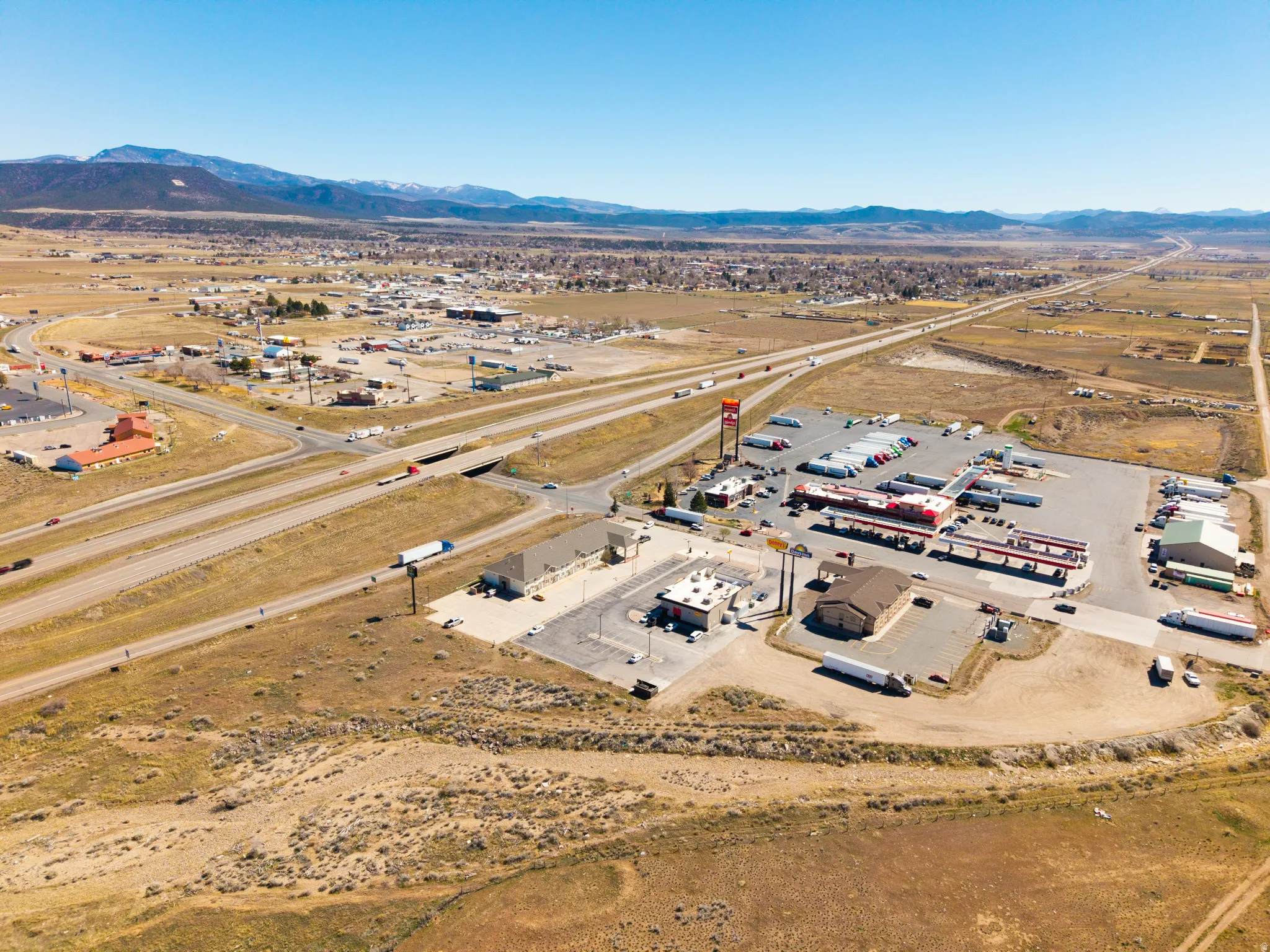 Aerial overview of property's location with mountains