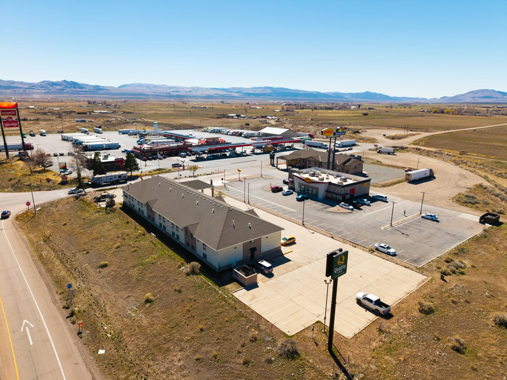 Drone / aerial view of a mountainous background