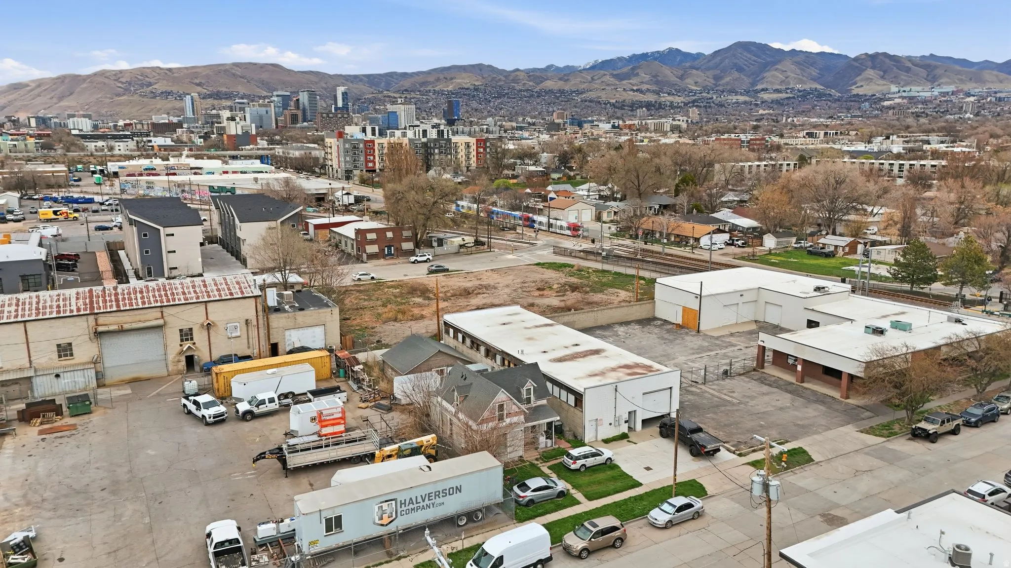 Drone / aerial view of mountains and an industrial area