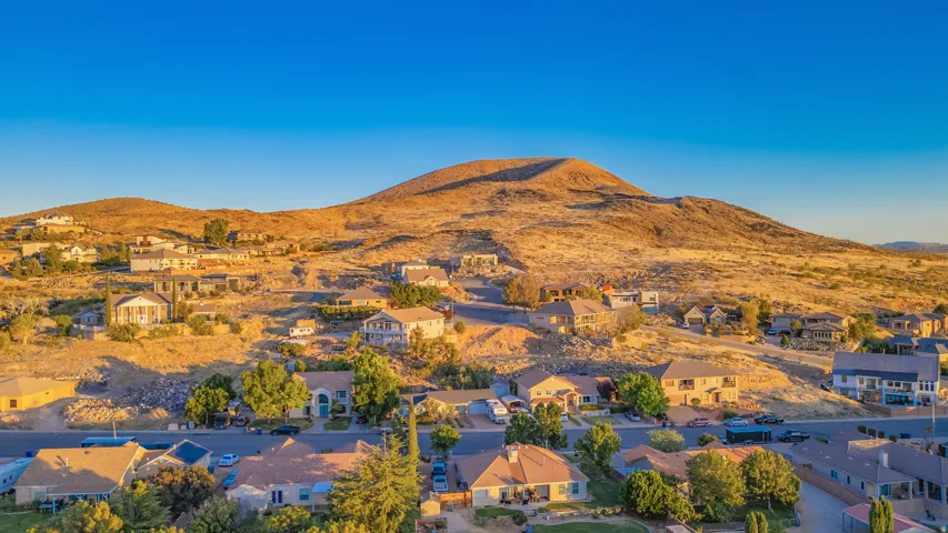 Aerial view of residential area with mountains