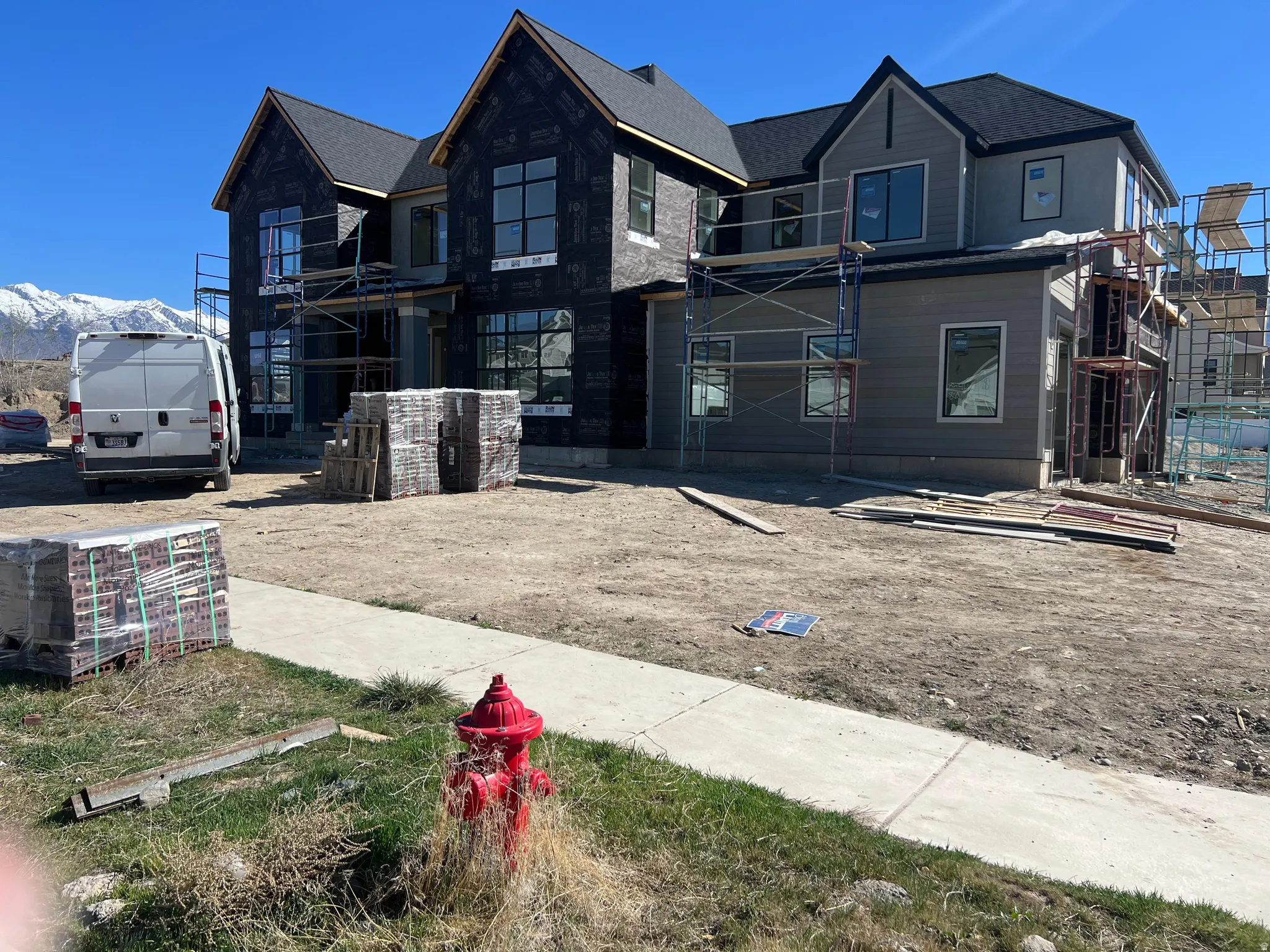 View of front of home featuring a mountain view