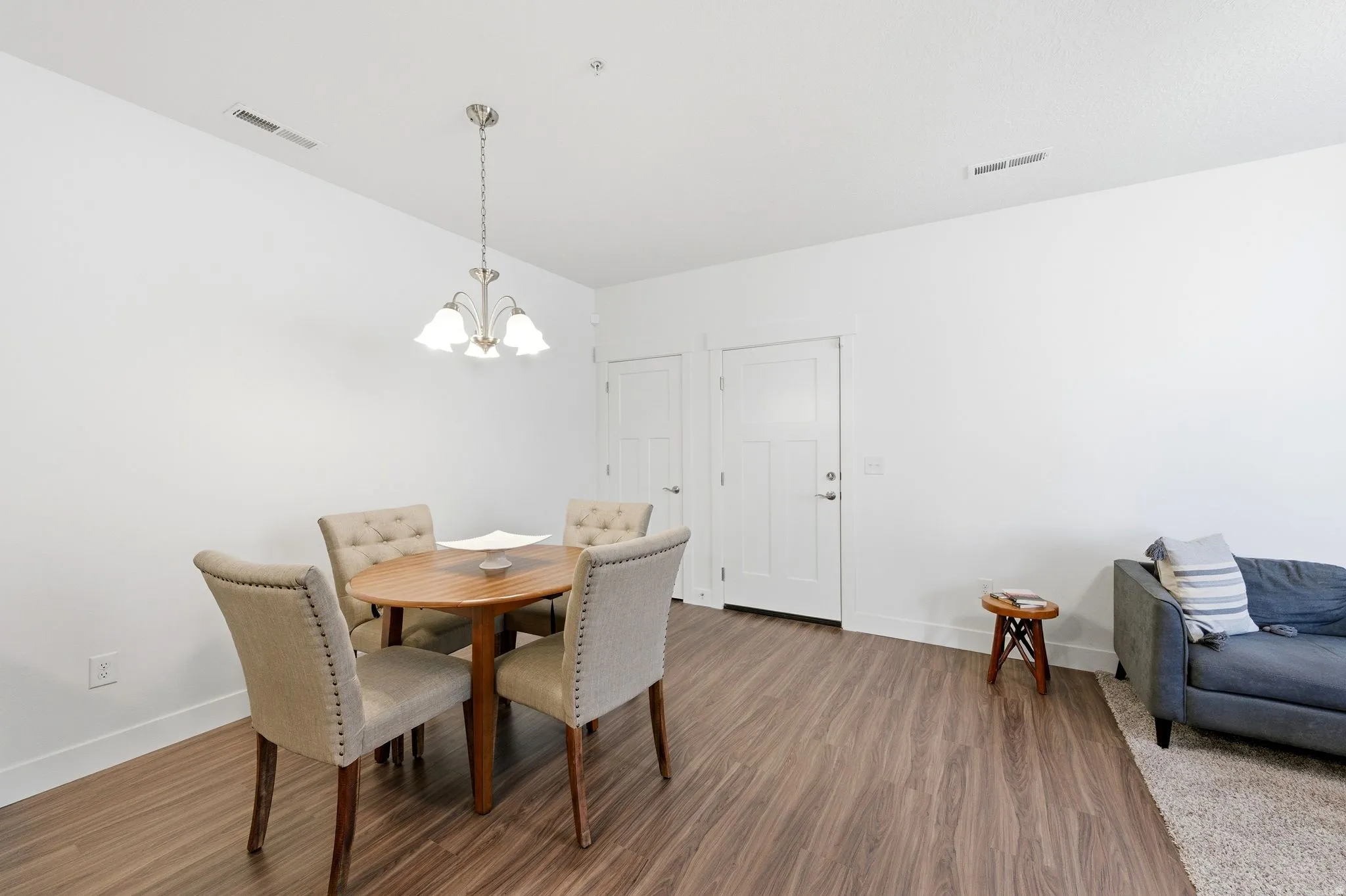 Dining area featuring a chandelier and wood finished floors