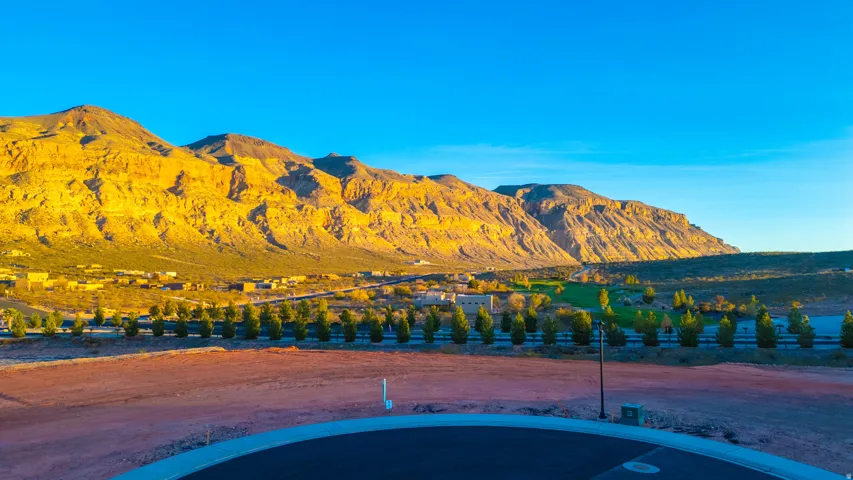 View of swimming pool with a mountain view