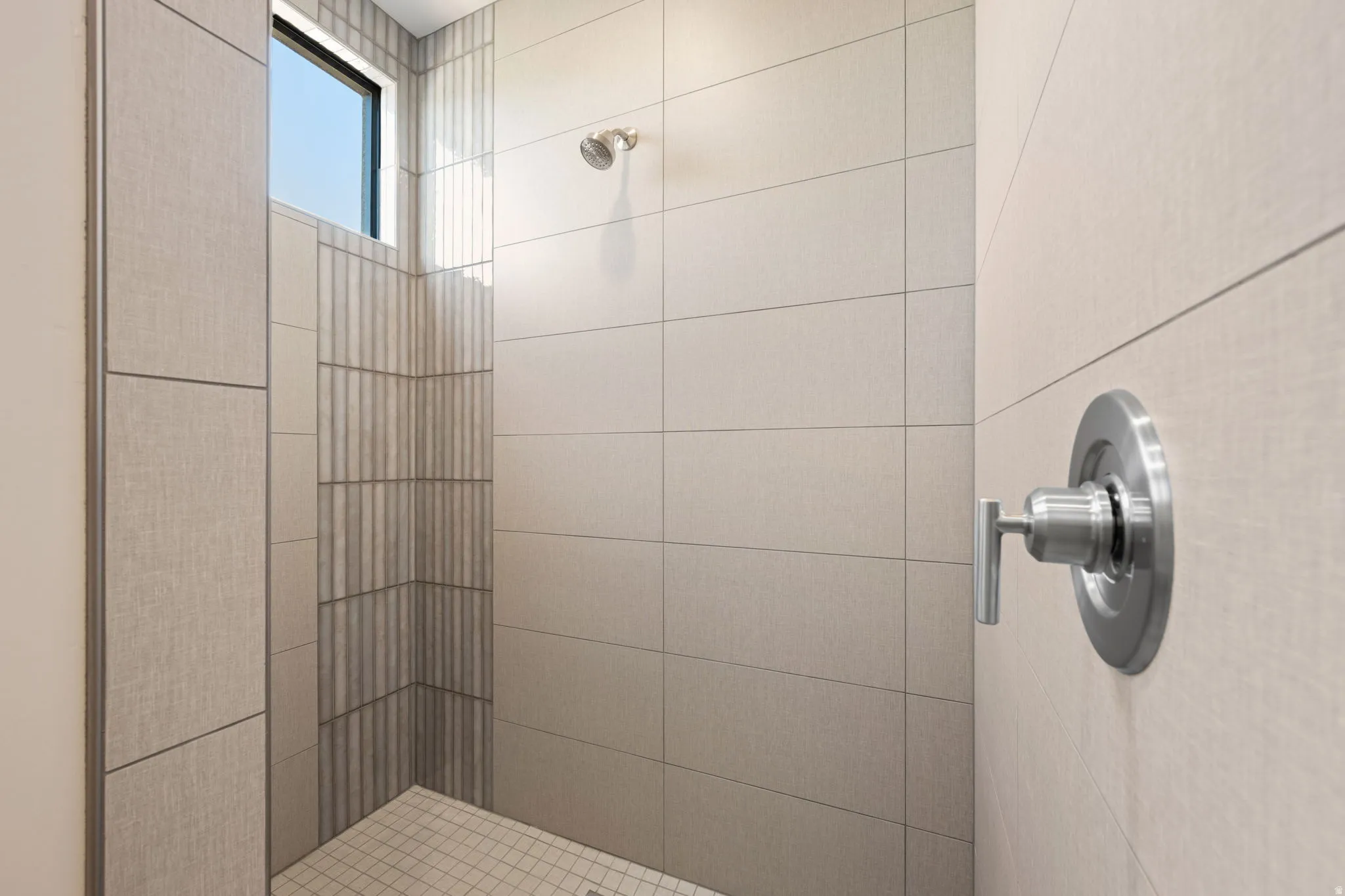 Full bathroom with a shower stall