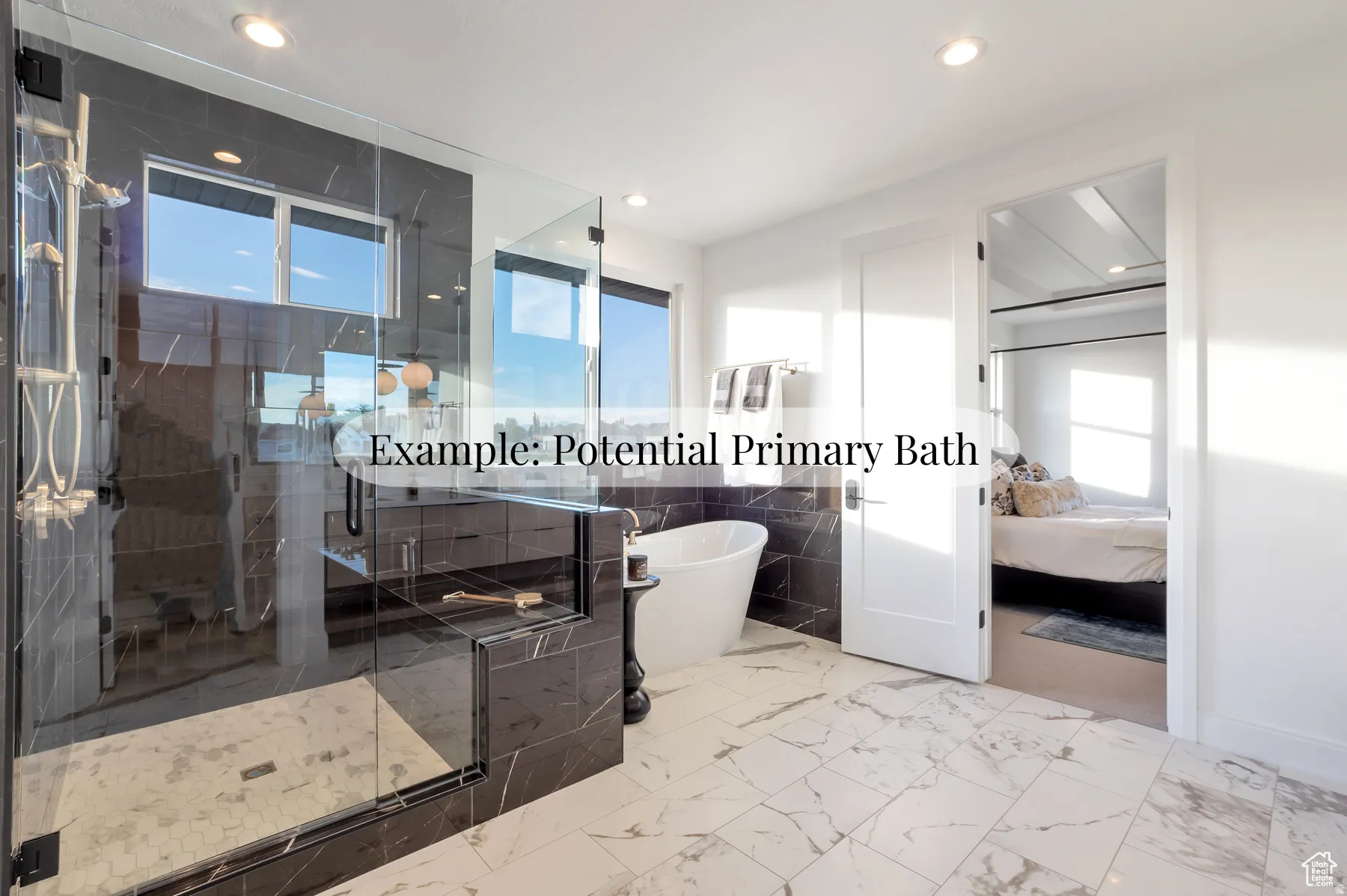 Full bath featuring ensuite bathroom, tile walls, a marble finish shower, a freestanding bath, and light marble finish floors