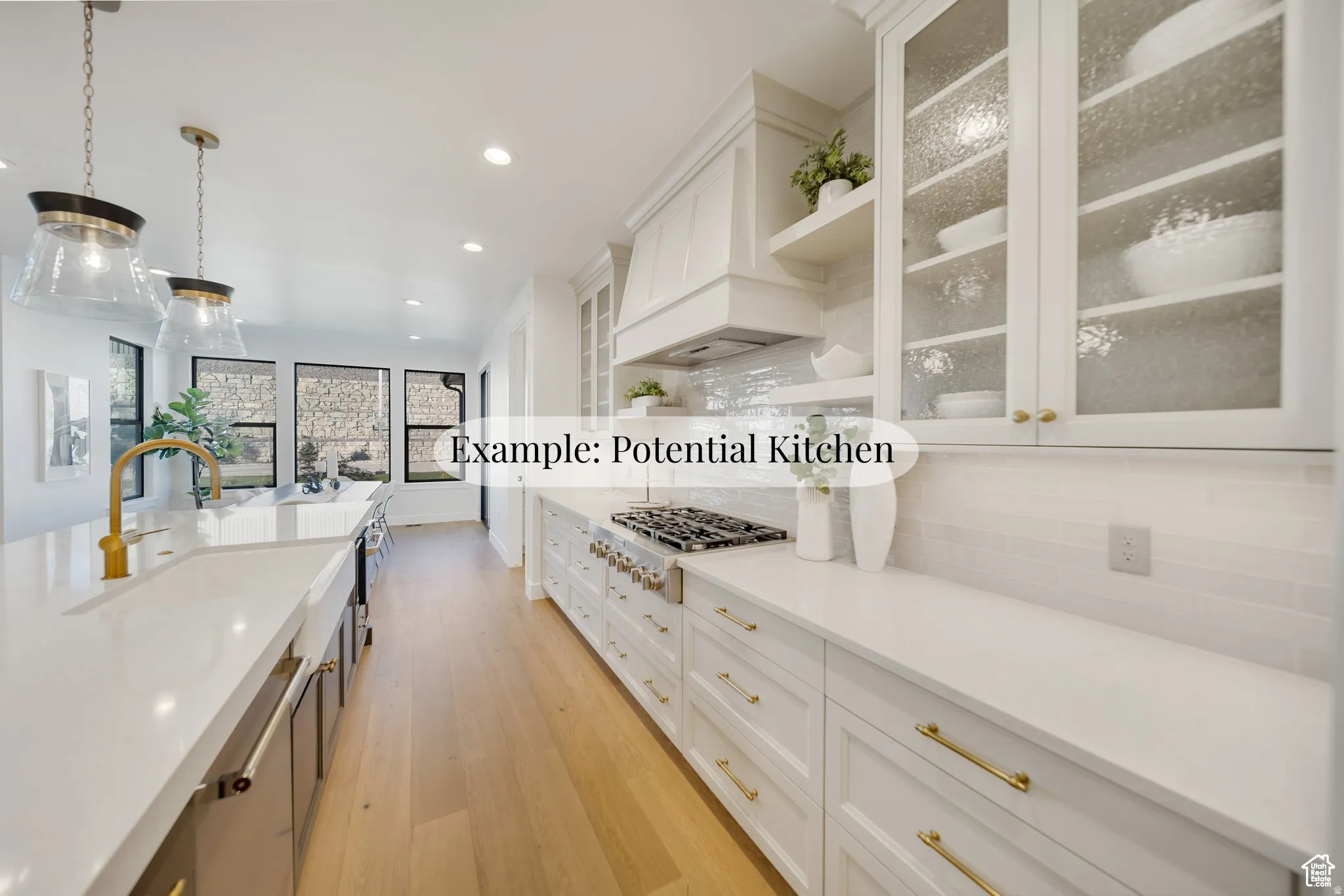 Dual tone kitchen with light wood finished floors, decorative backsplash, pendant lighting, glass insert cabinets, and stainless steel gas cooktop
