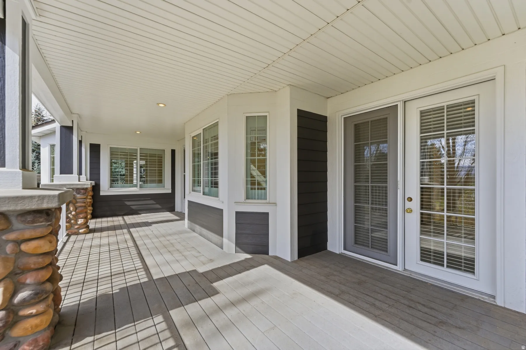 Enclosed patio with entrances from both the family room and the primary bedroom.