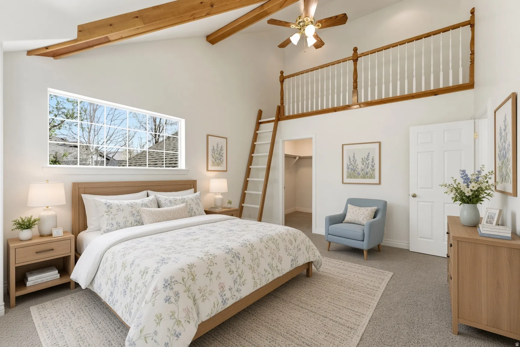 Vaulted ceiling with exposed wood beams, large horizontal window, wood ladder, interior balcony with wood railing, and ceiling fan