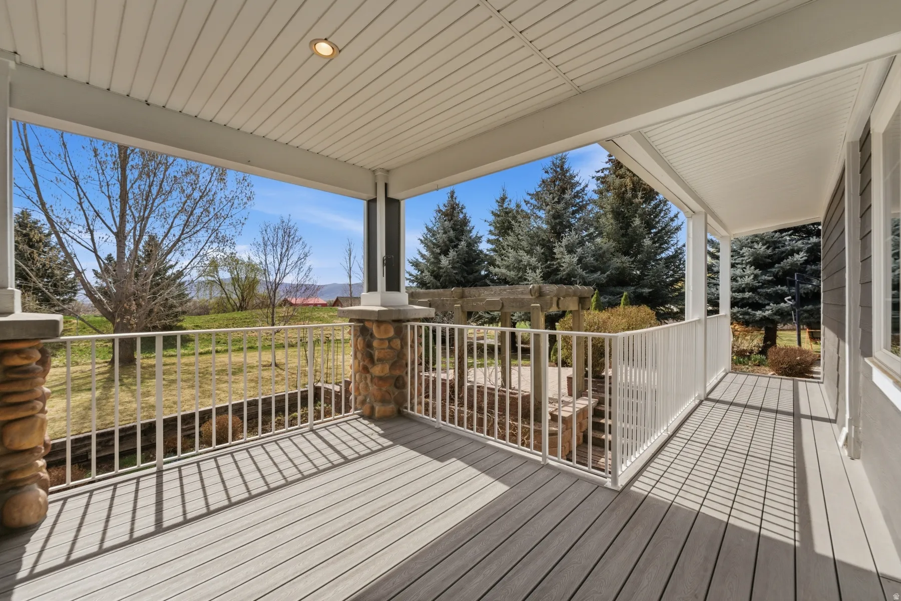 Balcony outside the kitchen area. Walk way to the driveway and yard,