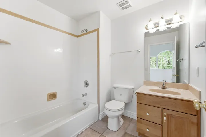 This bathroom is ensuite with the second upstairs Bedroom.