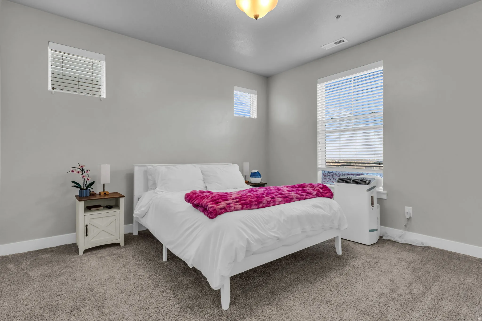 Bedroom with carpet flooring