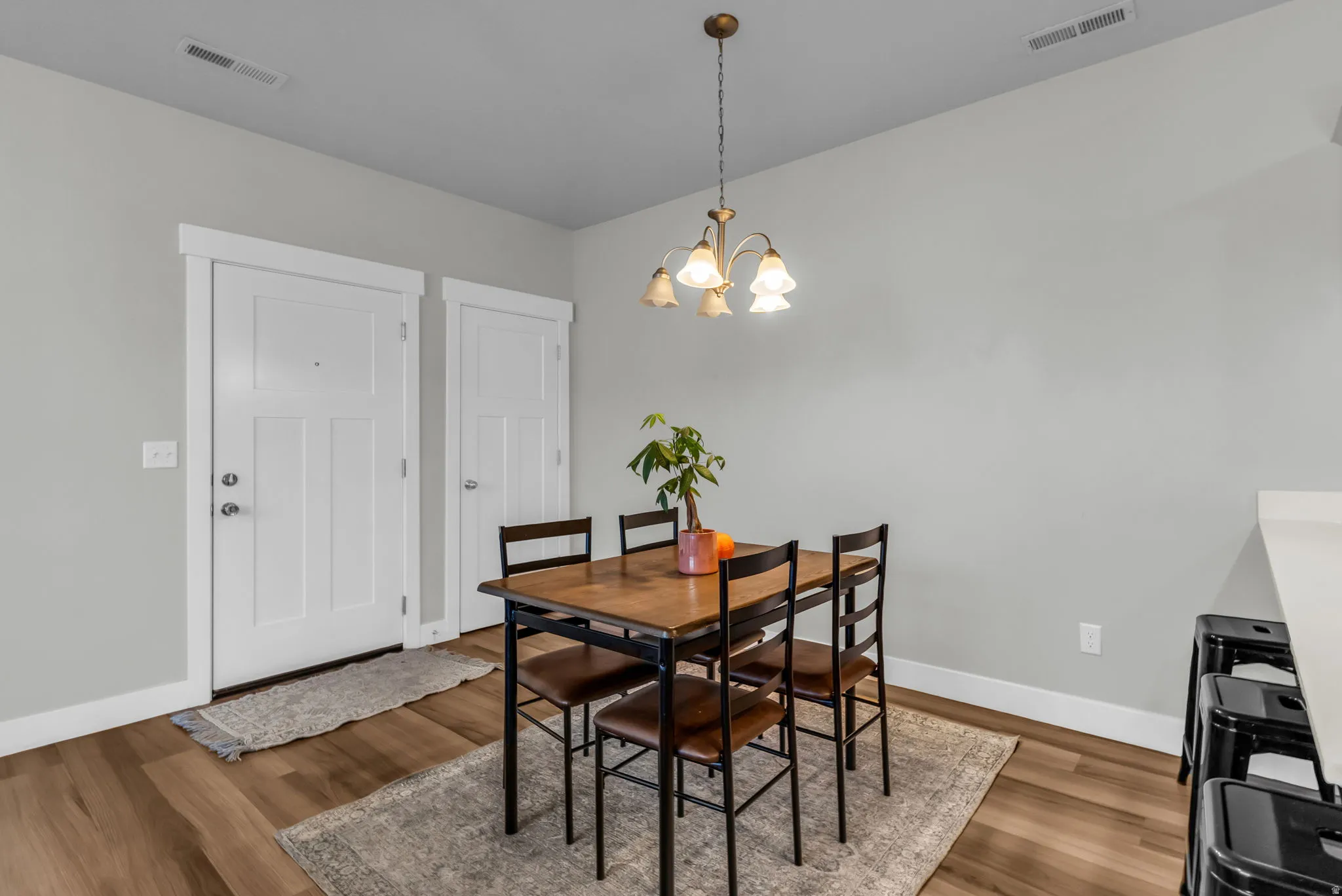 Dining room featuring a chandelier and wood finished floors