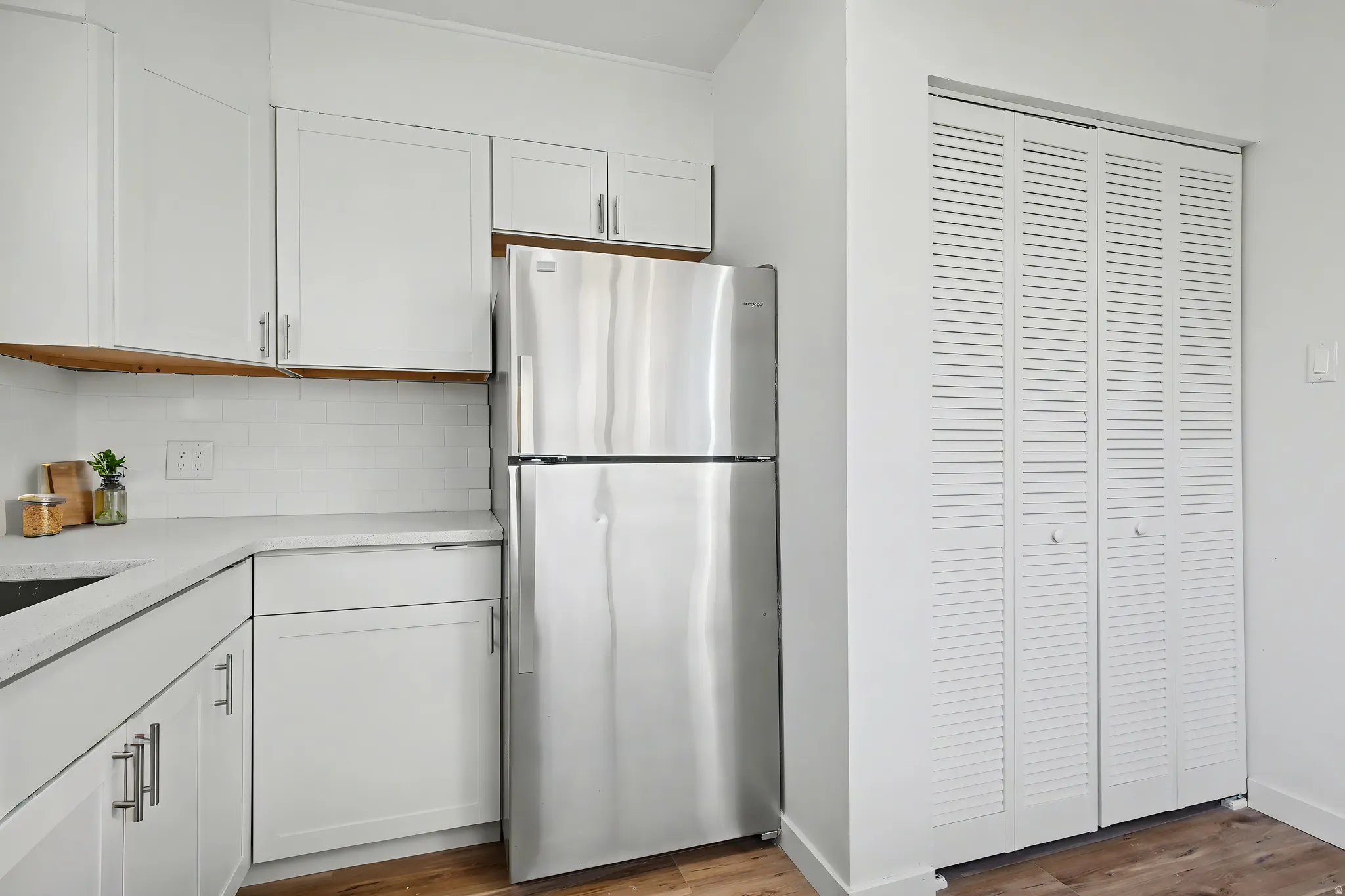 Updated Kitchen virtually staged with Stainless Steel Fridge