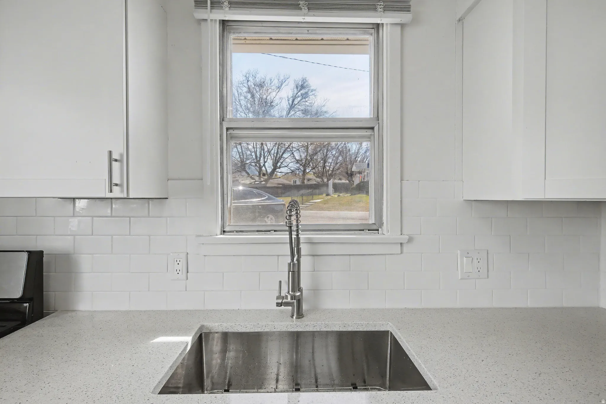 Kitchen sink facing exterior view