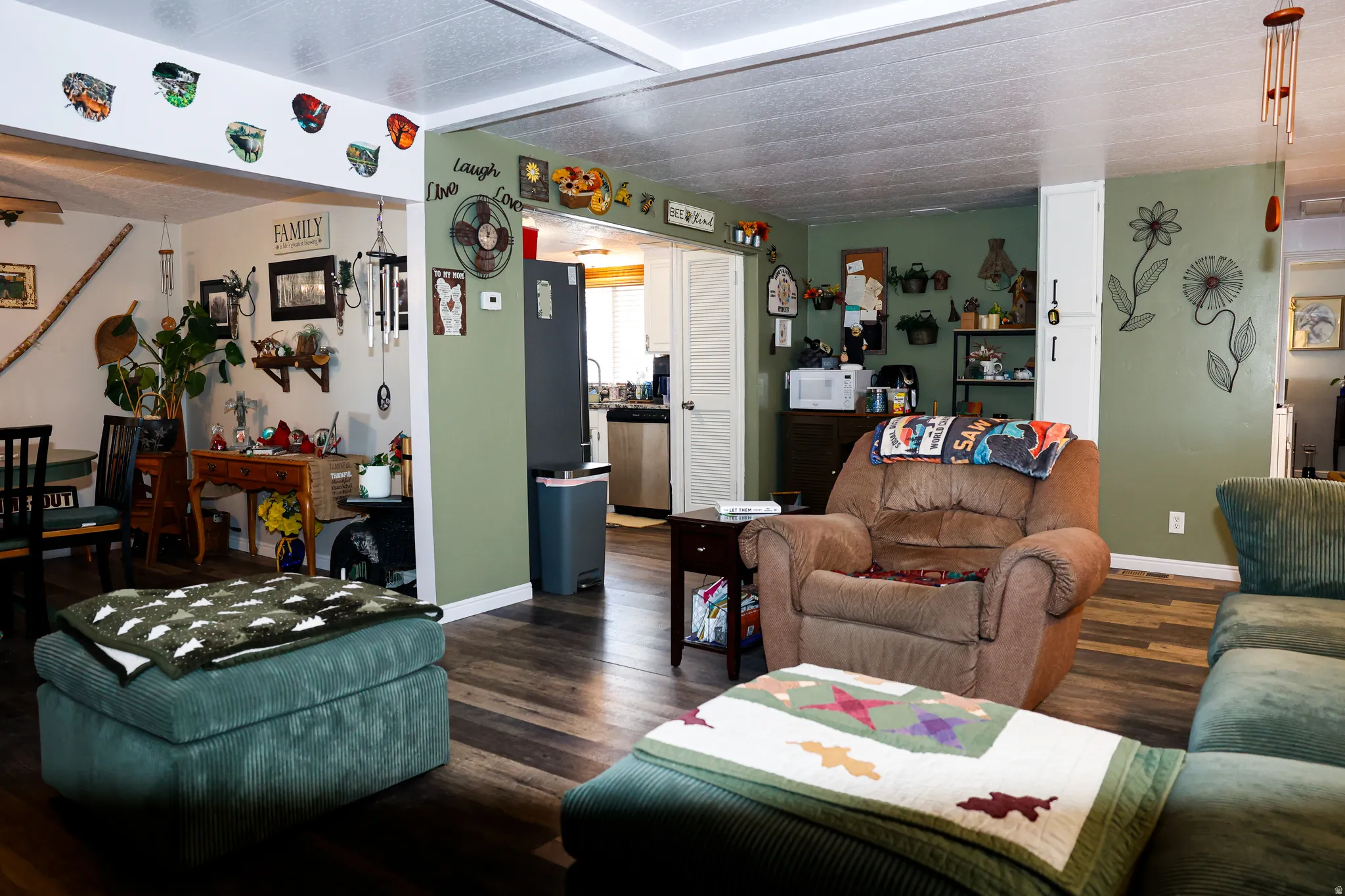 Living room with dark wood-style flooring