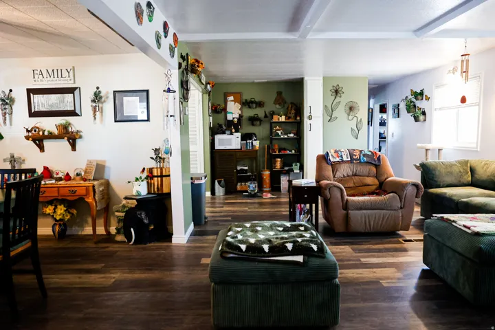 Living area featuring wood finished floors and baseboards