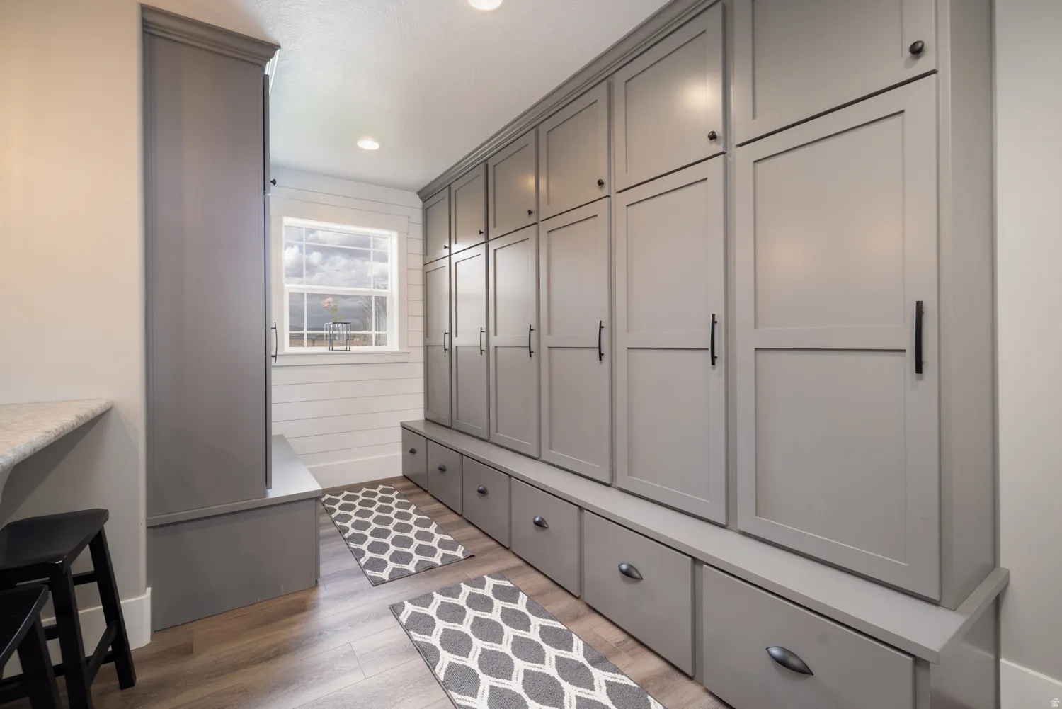 Mudroom featuring light wood-style floors and recessed lighting