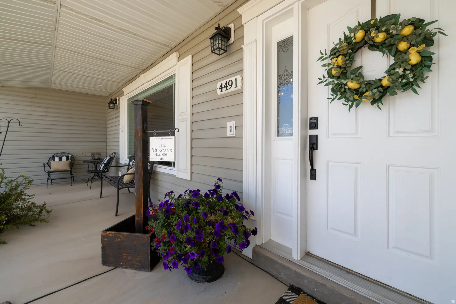 View of exterior entry featuring a porch