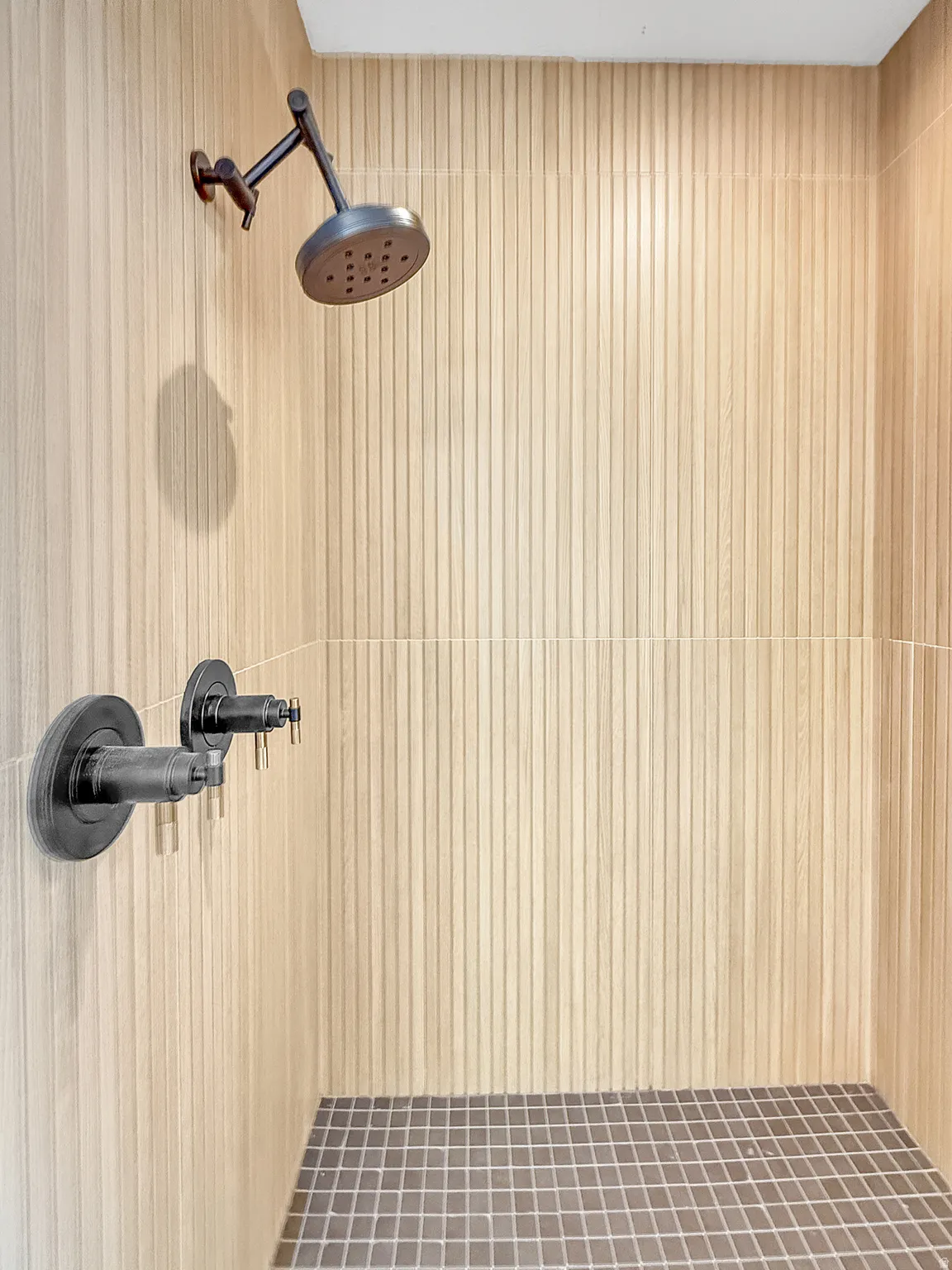 Bathroom view of a tile shower