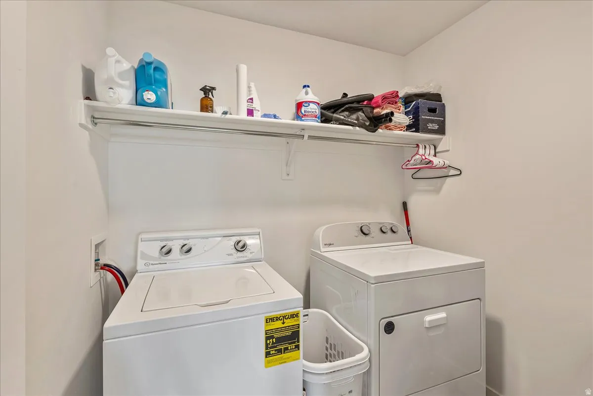 Laundry area featuring independent washer and dryer