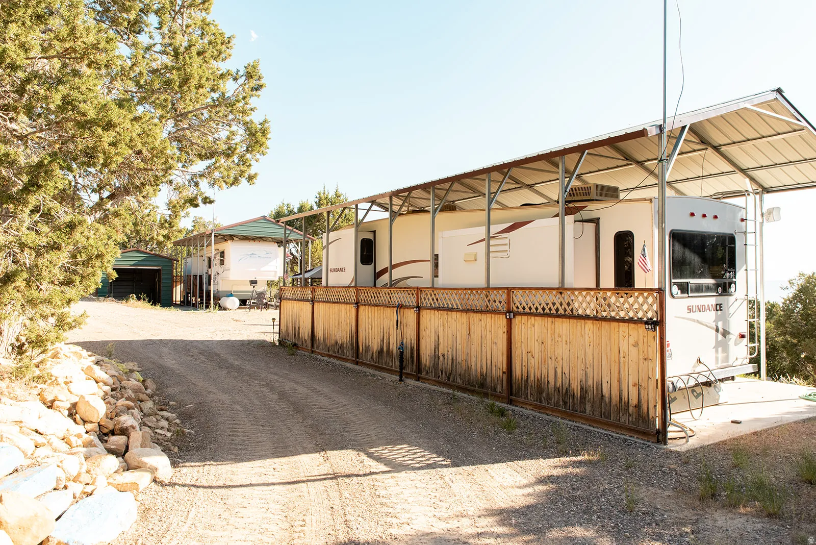 View of home's exterior with an outdoor structure