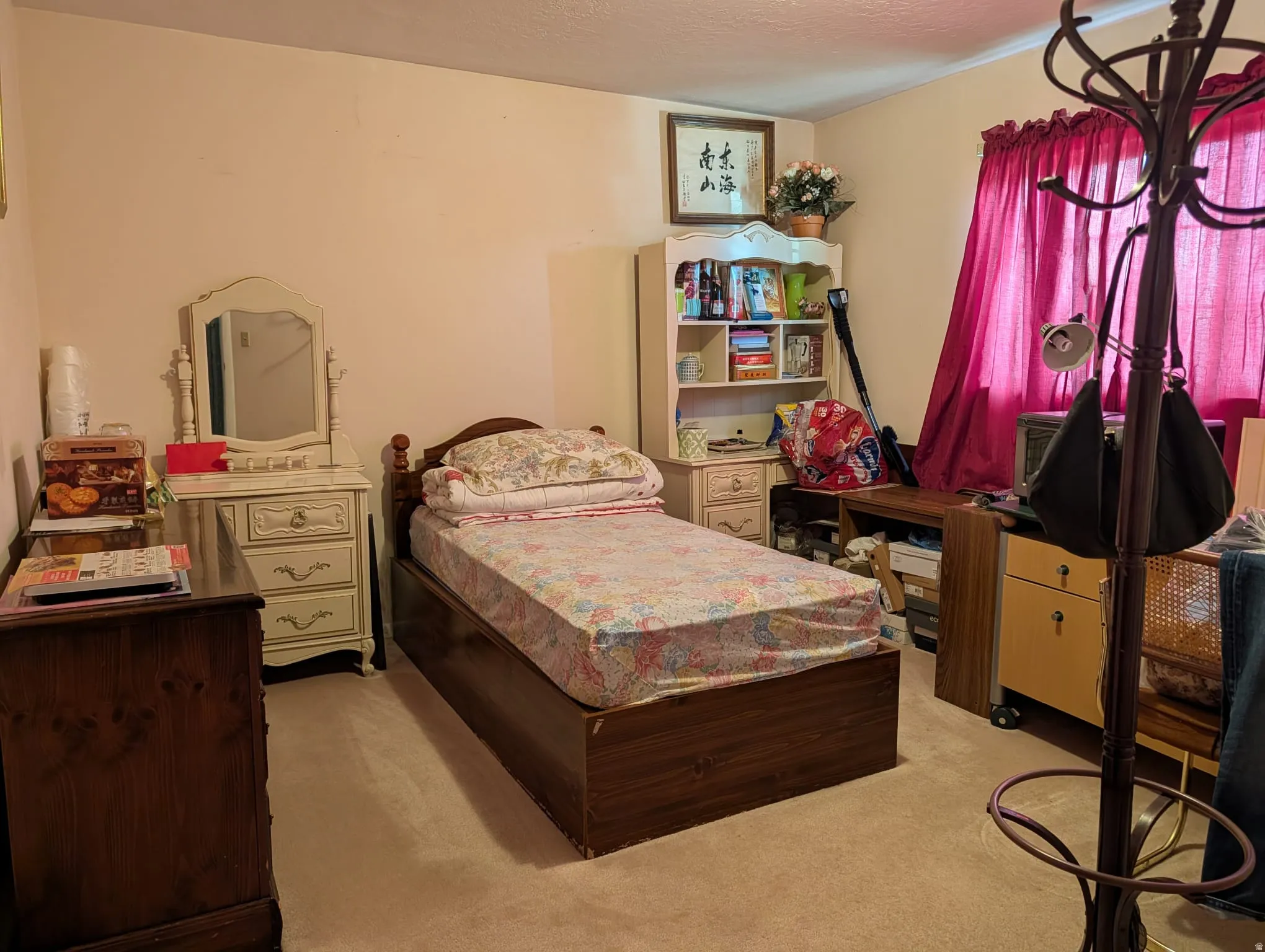Bedroom with light carpet