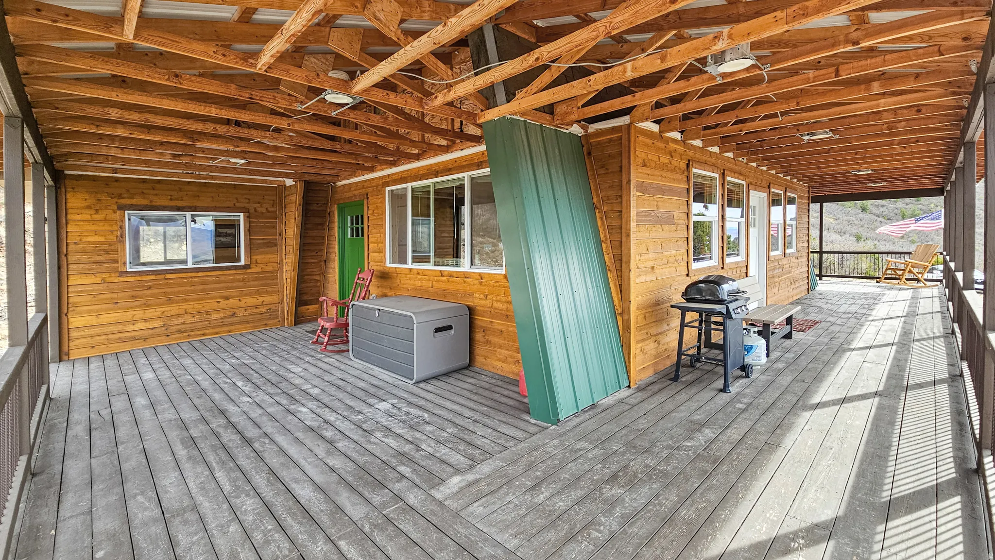 Deck featuring area for grilling