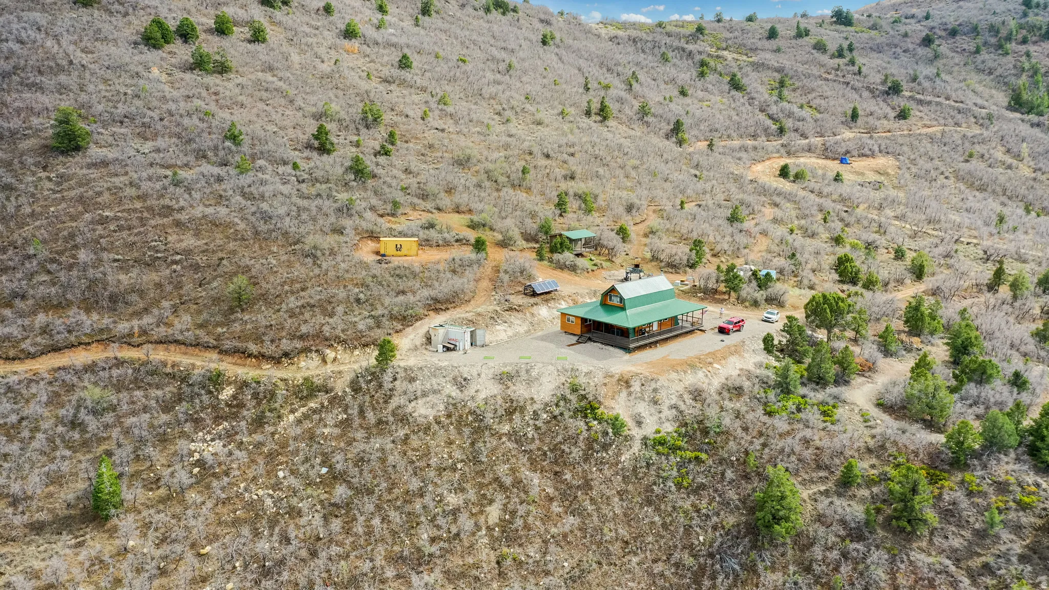 View of rural area with a desert landscape and a mountain backdrop