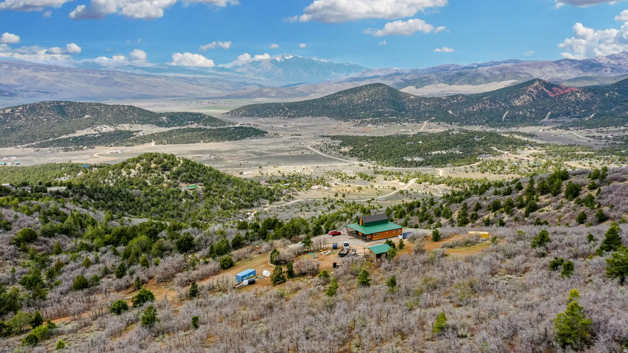 View of mountain background featuring rural landscape