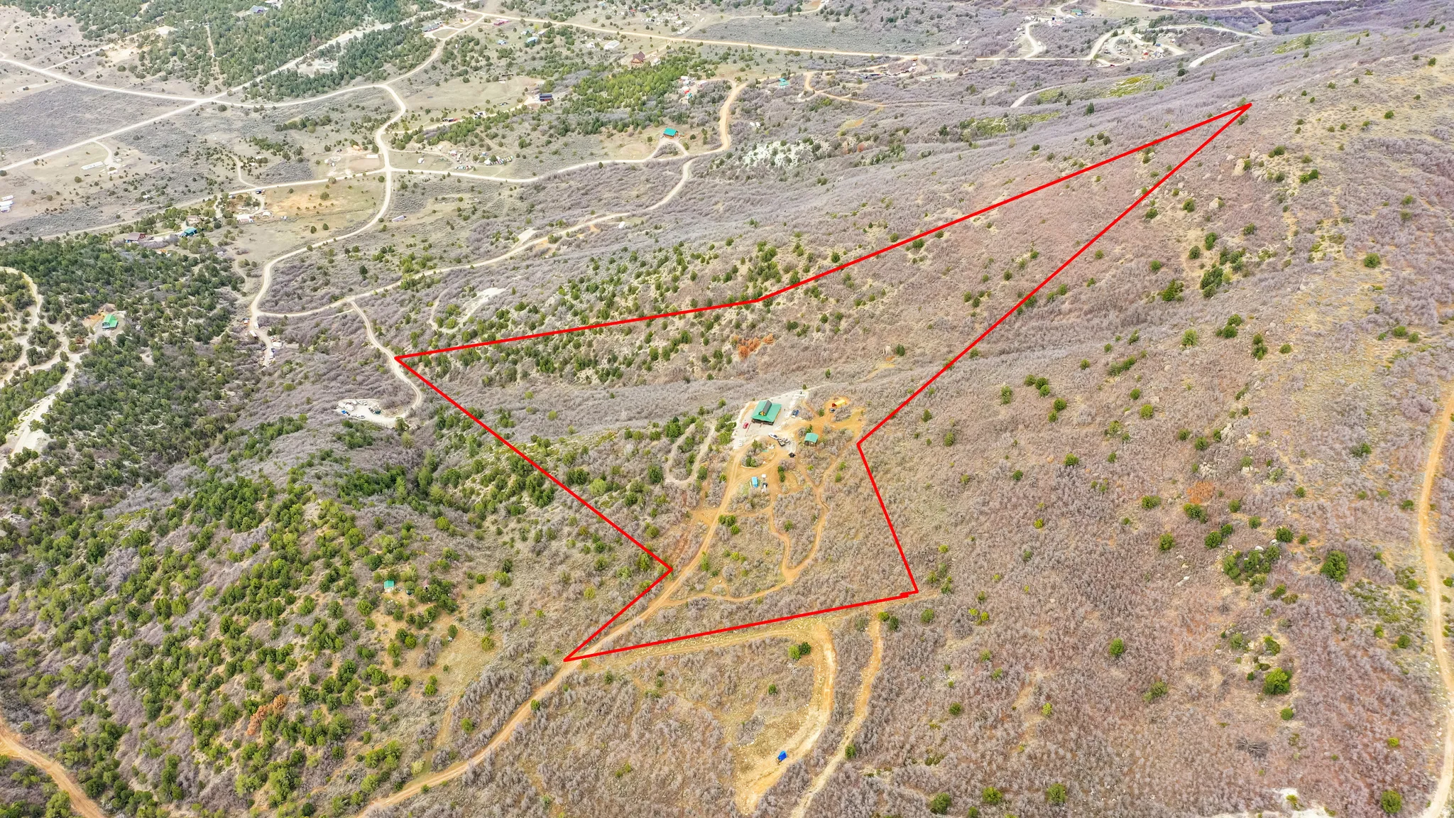 Overview of rural landscape with property parcel outlined and a desert landscape