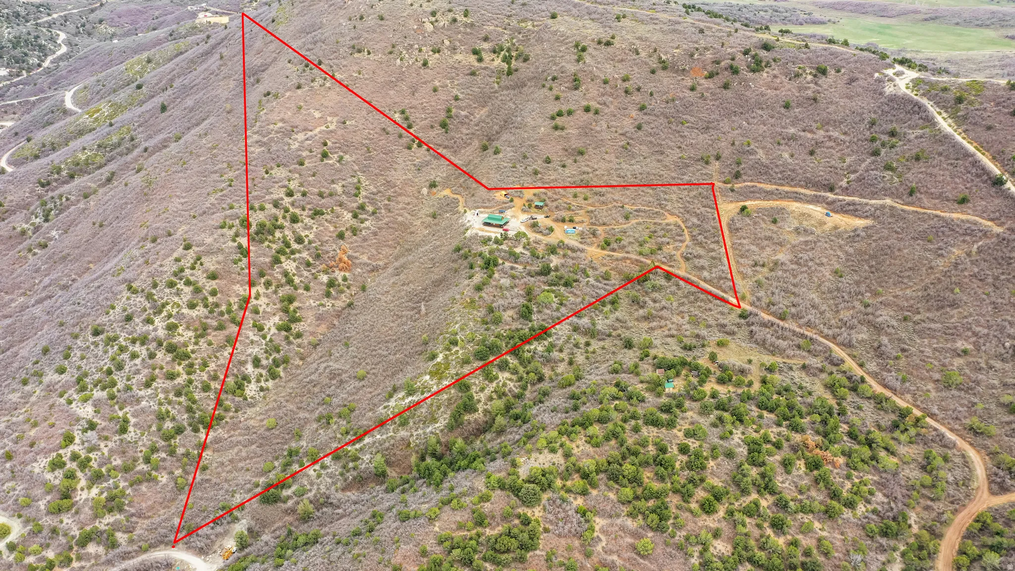 Overview of rural landscape with property boundaries highlighted and a desert landscape
