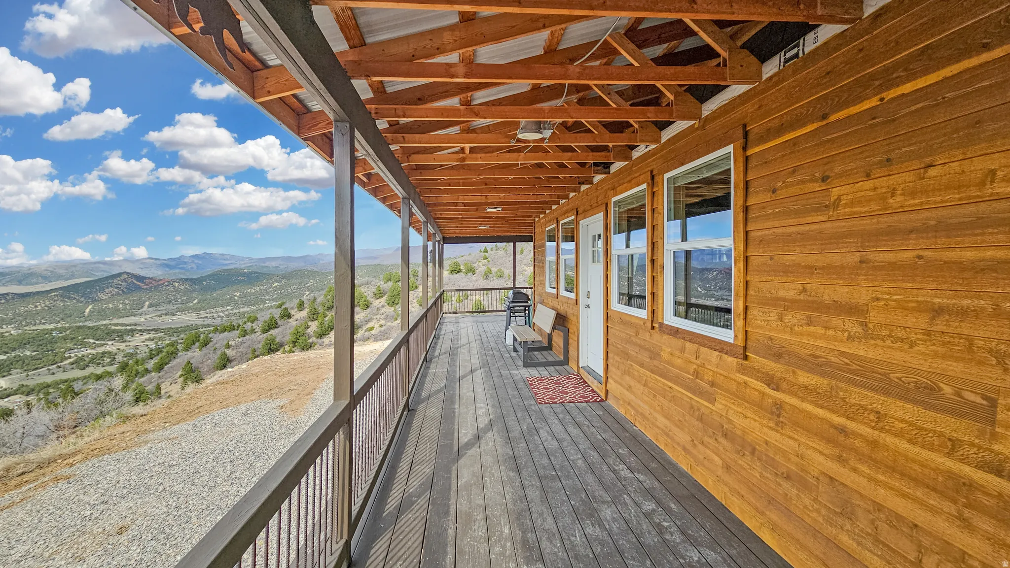 Wooden deck featuring a mountain view