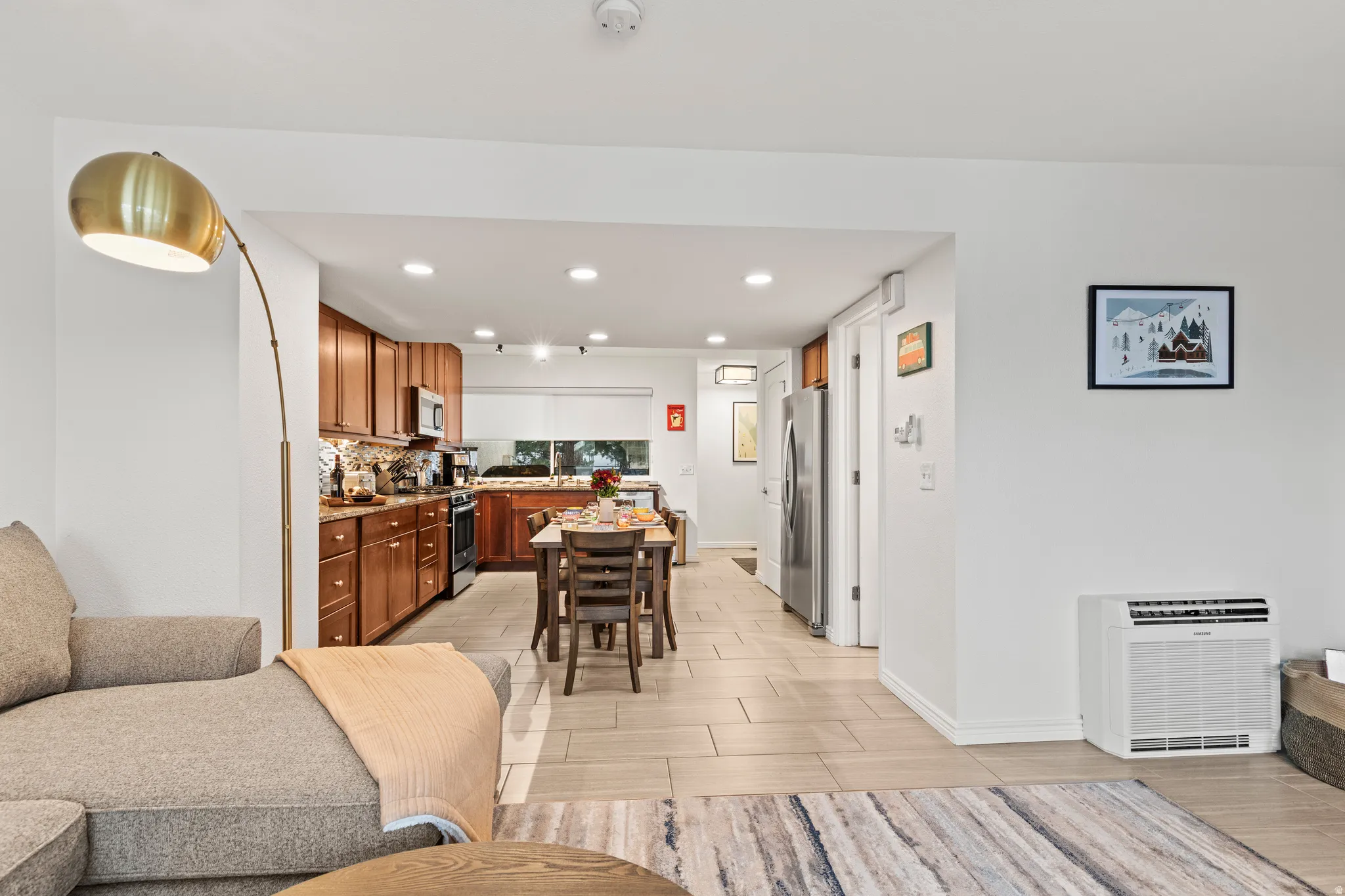 Dining room featuring recessed lighting and heating unit