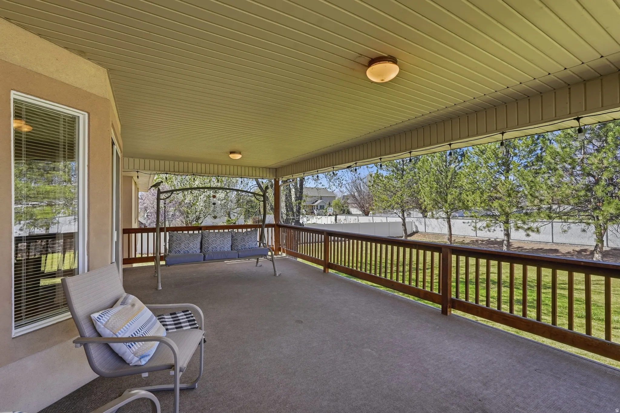 View of fenced backyard