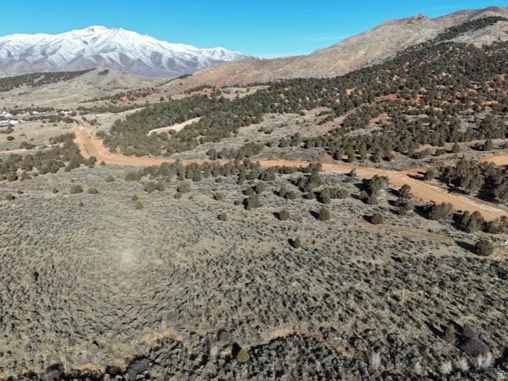 View of mountain backdrop featuring a desert landscape