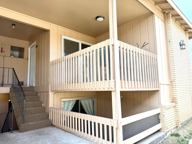 View of property exterior with board and batten siding