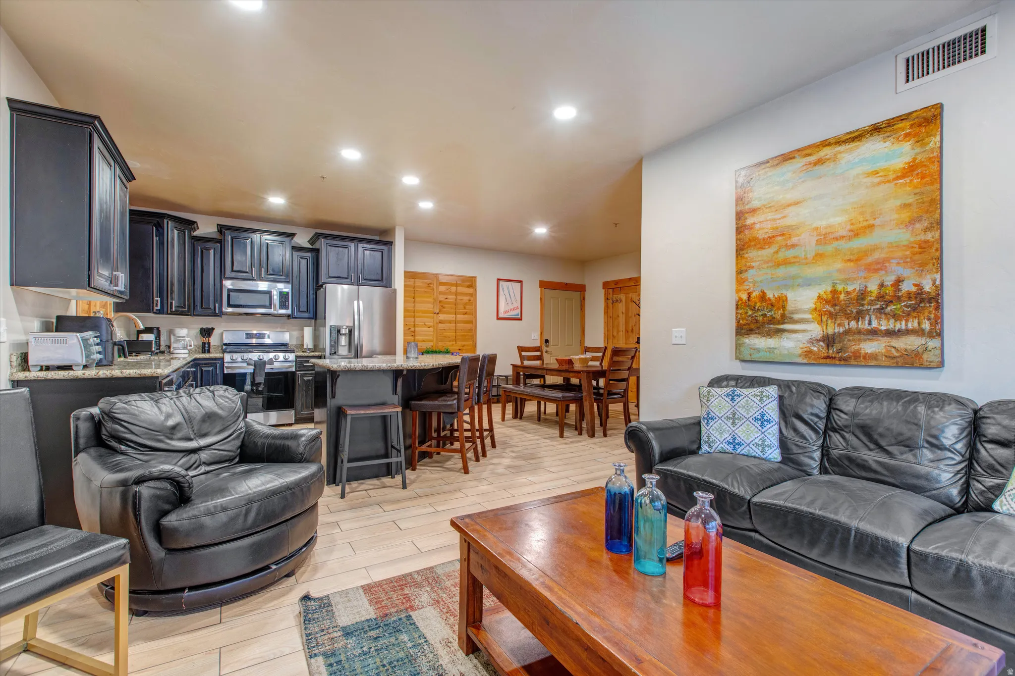 Living room featuring recessed lighting and wood finish floors