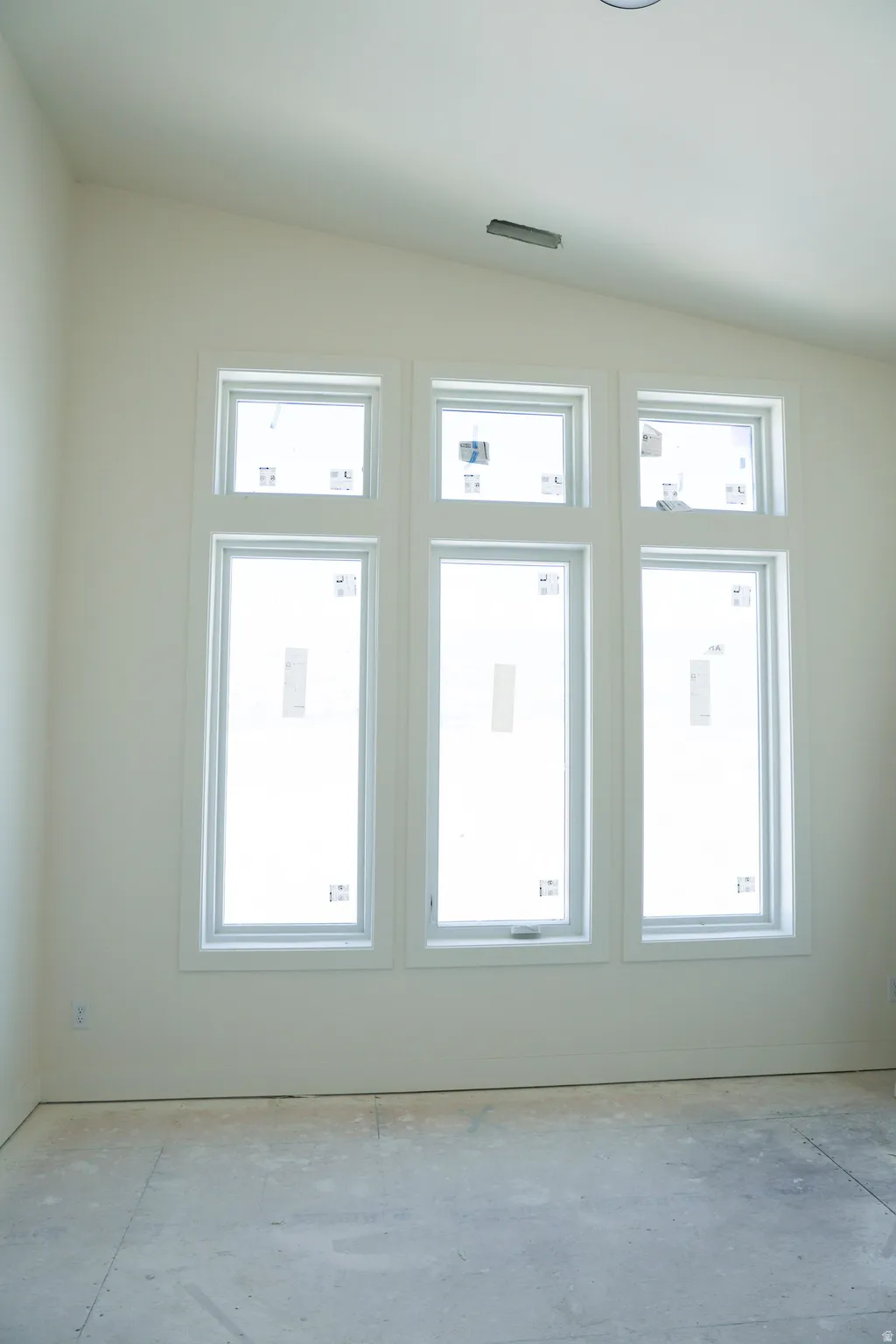 Empty room featuring healthy amount of natural light