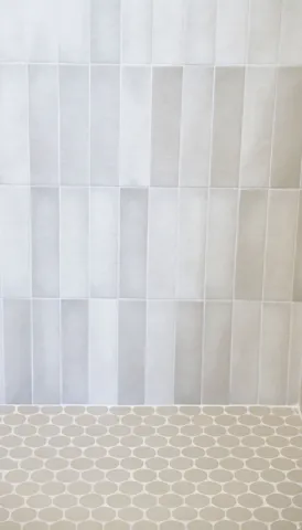 Full bath featuring a tile shower
