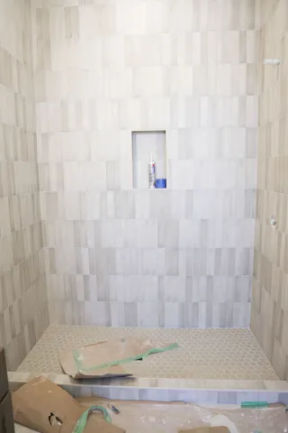 Full bath with tiled shower