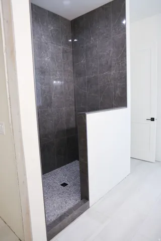 Full bath featuring a walk in shower