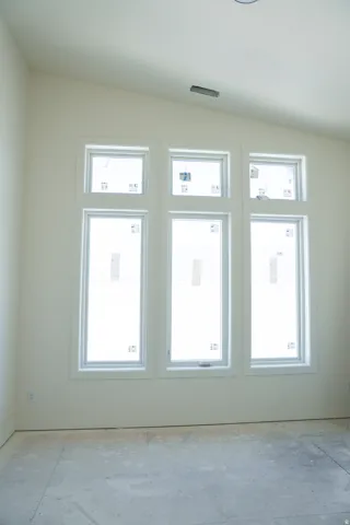 Empty room featuring healthy amount of natural light