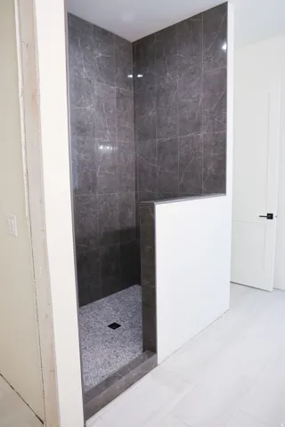 Full bathroom with a walk in shower