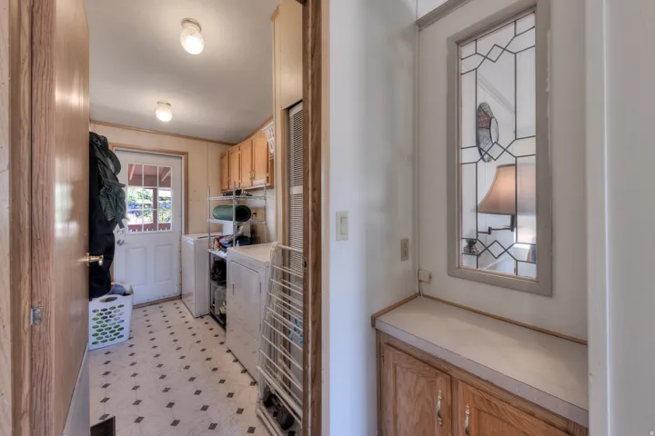 Laundry area and walk out to back deck.
