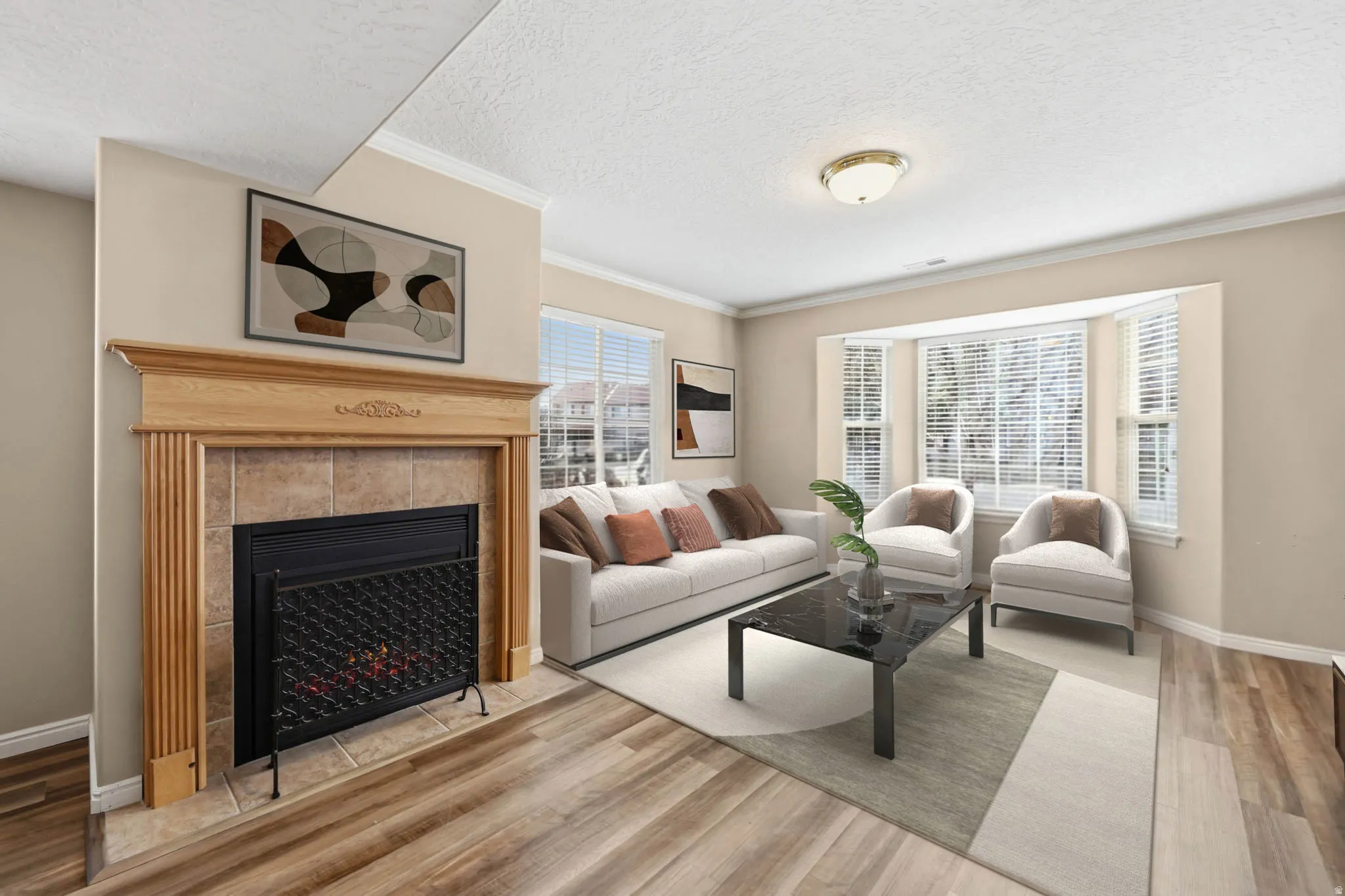 Living Room with Bay Window - Virtually staged to show possible layout of living room furniture.