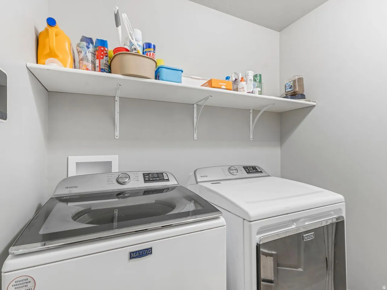 Laundry area with separate washer and dryer