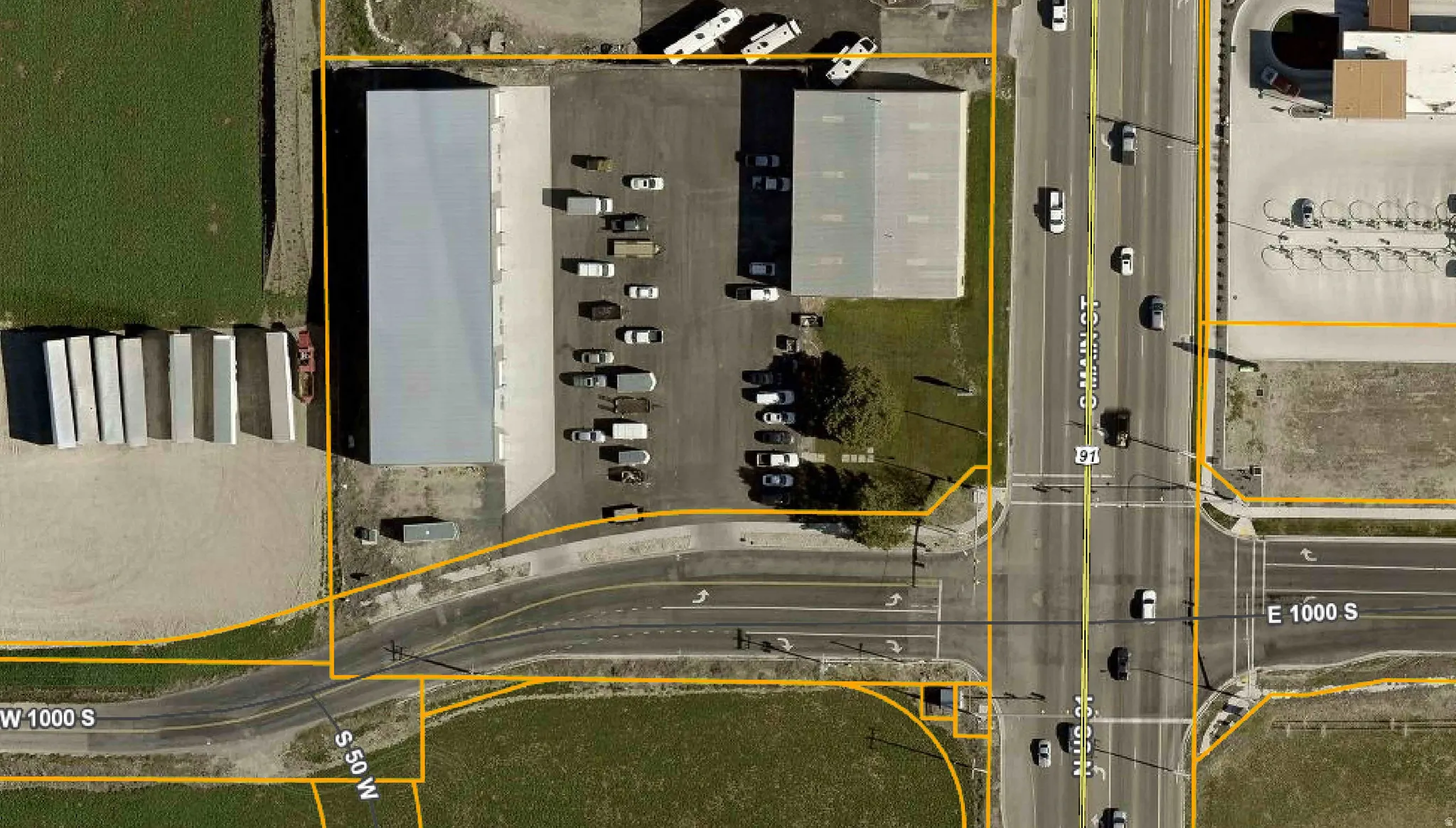 Aerial overview of property's location with property parcel outlined